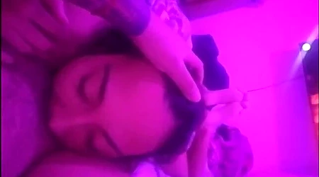 eating babe under the soft pink light